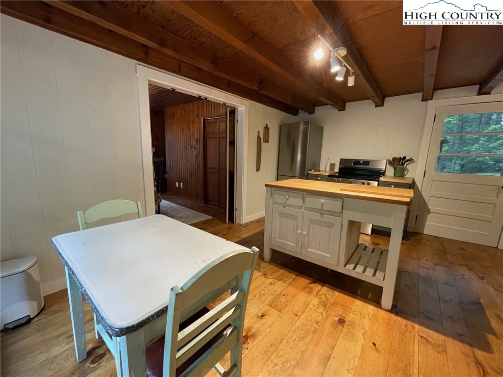 217 Holiday Hills Drive Boone, NC 28607 - Photo 24 of 47 a kitchen with a stove and a refrigerator
