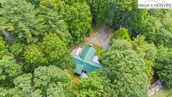 217 Holiday Hills Drive Boone, NC 28607 - Photo 45 of 47 an aerial view of a house with a yard and outdoor seating