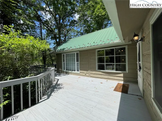 a view of a house with a porch