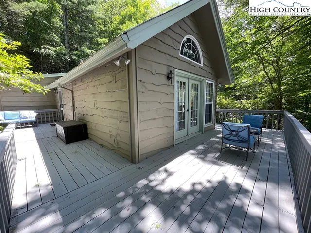 a view of sitting area in front of house