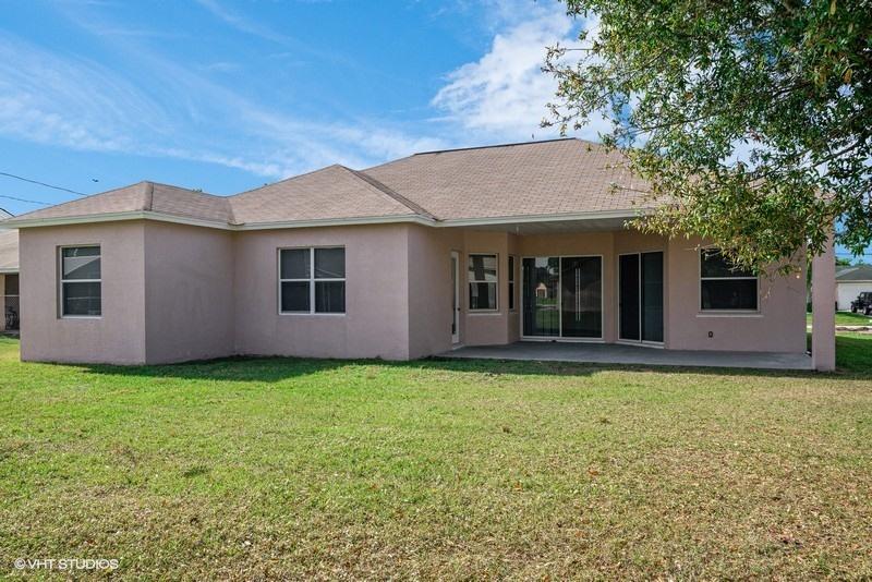 549 Southwest Aster Road Port St. Lucie, FL 34953 - Photo 12 of 12 12_549SWAsterRoad_26_BackYard_FlexMLS800