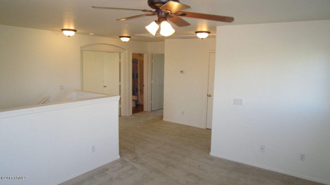 44107 Roth Road Maricopa, AZ 85138 - Photo 19 of 41 loft looking to bedrooms