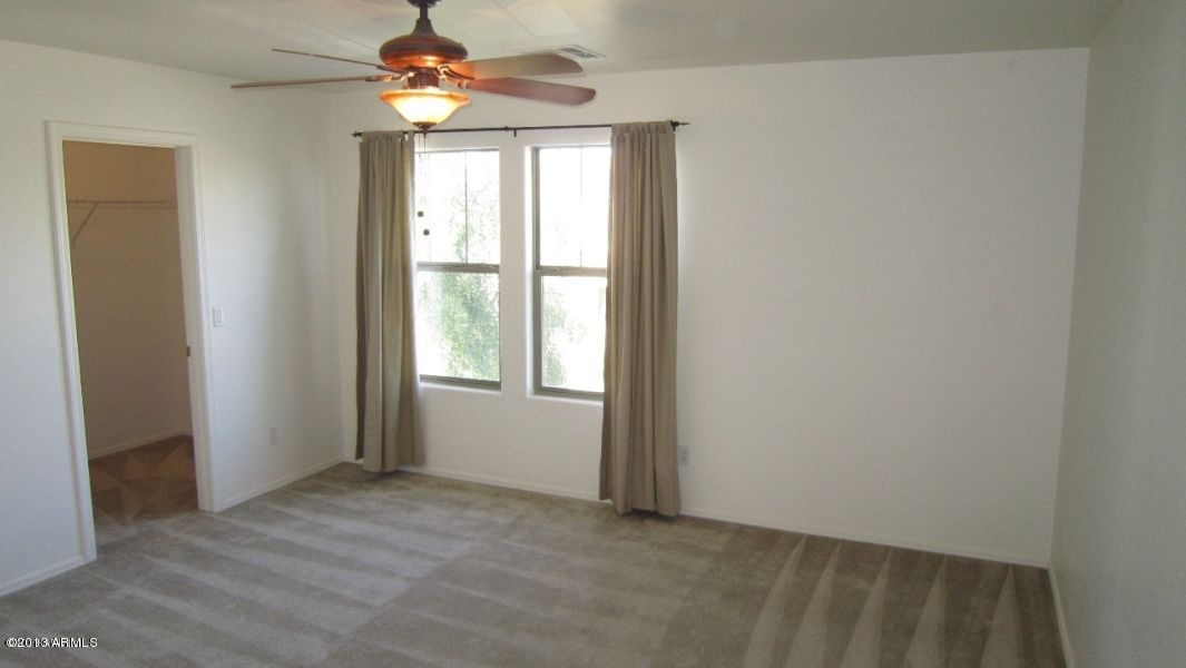44107 Roth Road Maricopa, AZ 85138 - Photo 20 of 41 bedroom 1, walk-in closet