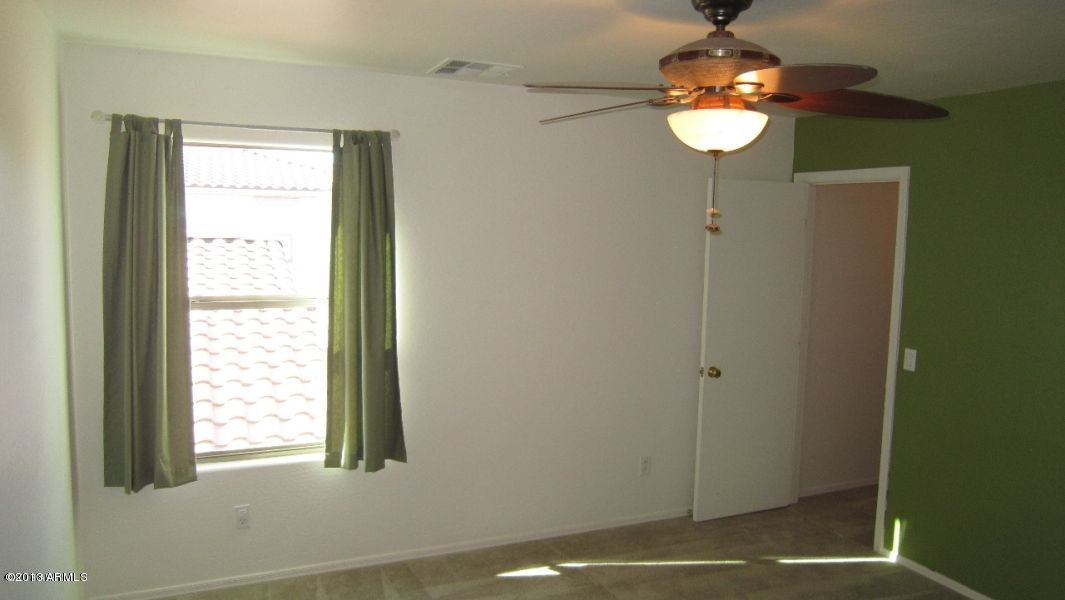 44107 Roth Road Maricopa, AZ 85138 - Photo 22 of 41 bedroom 2, walk-in closet