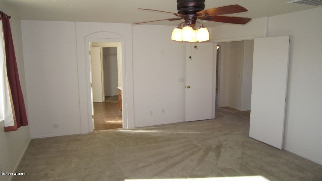 44107 Roth Road Maricopa, AZ 85138 - Photo 28 of 41 master bedroom, entrance to master bath