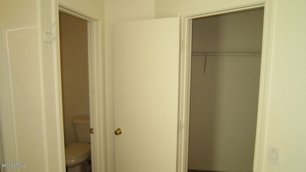 44107 Roth Road Maricopa, AZ 85138 - Photo 32 of 41 private toilet room and walk-in closet