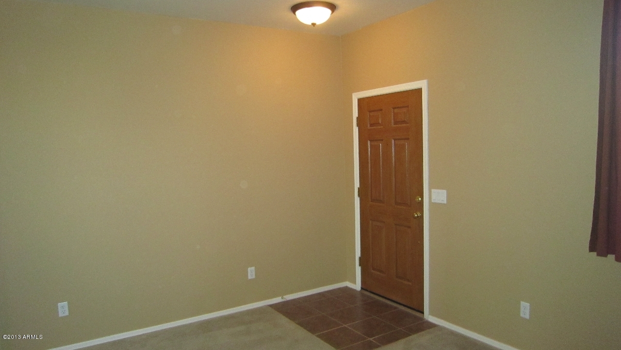 44107 Roth Road Maricopa, AZ 85138 - Photo 5 of 41 family room looking to front door