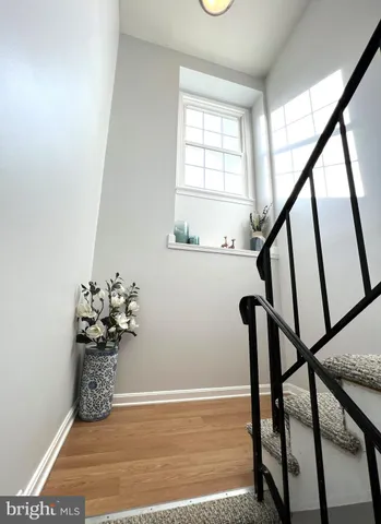 a view of entryway with wooden floor