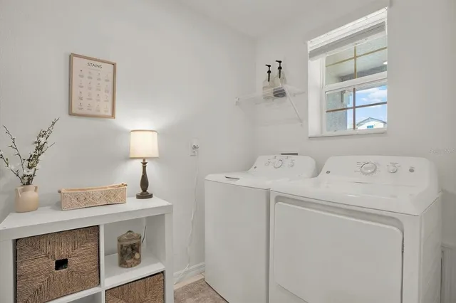 a view of a house with backyard and porch