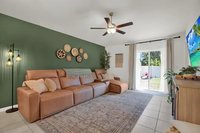 a living room with furniture and a window