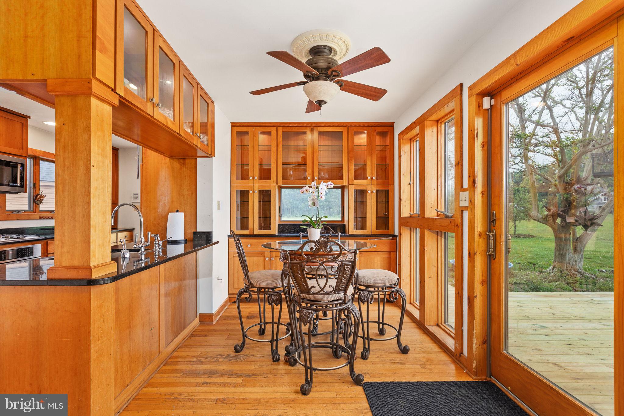 6119 Beach Road Midland, VA 22728 - Photo 30 of 98 a view of a dining room with furniture window and wooden floor