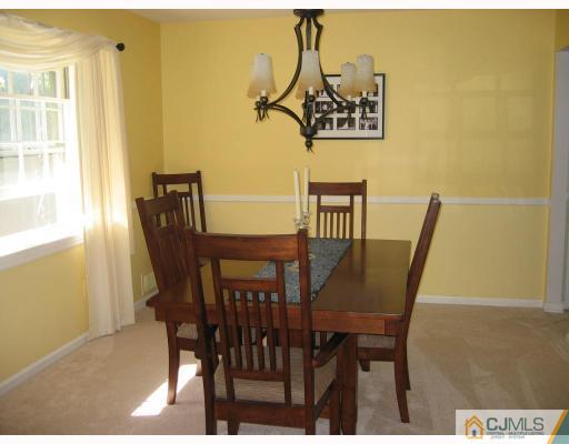 3 Kyle Road Somerset, NJ 08873 - Photo 2 of 10 a view of a dining room with furniture and window