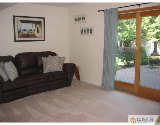 3 Kyle Road Somerset, NJ 08873 - Photo 4 of 10 a living room with furniture and a window
