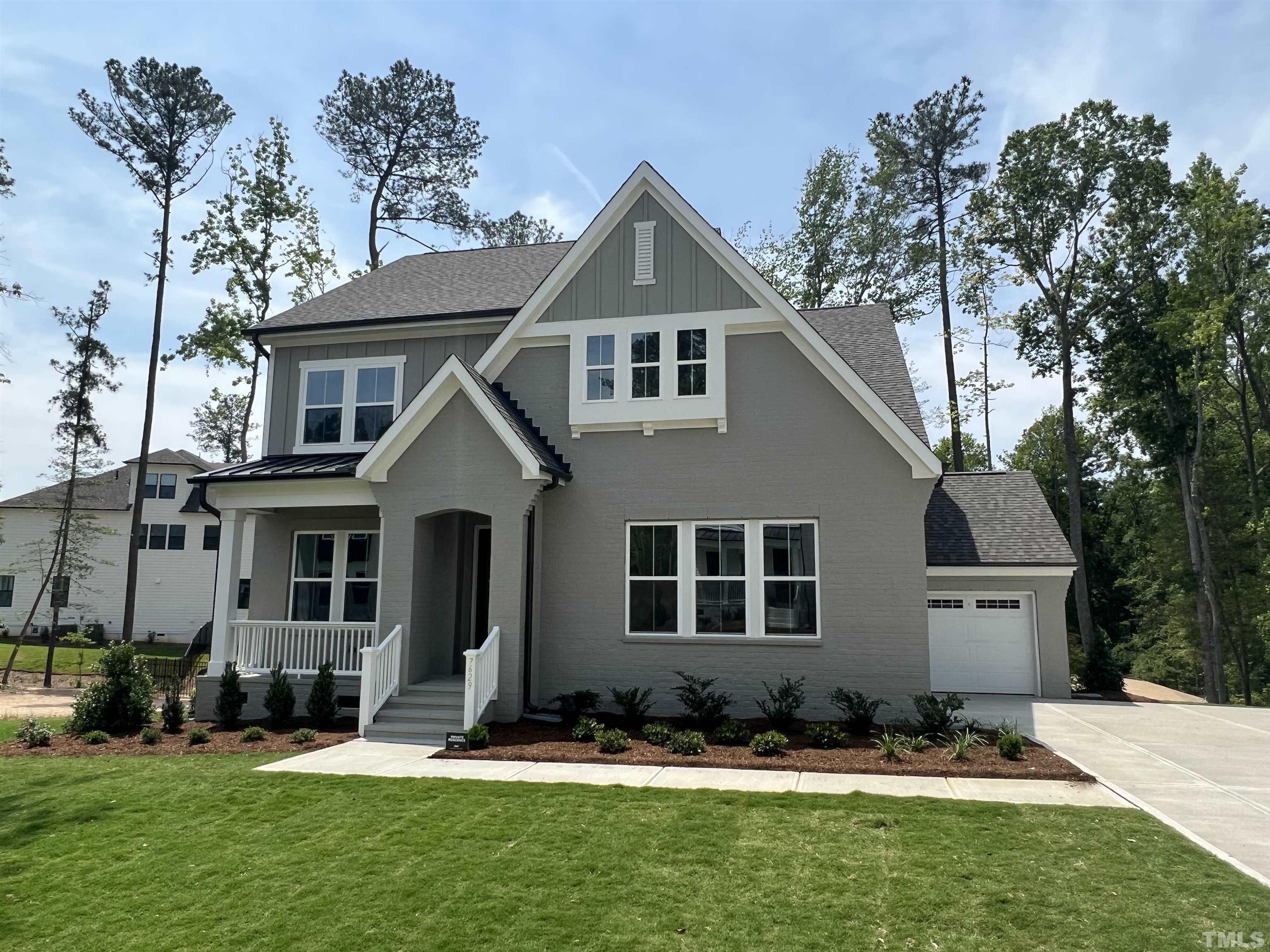 7629 Hasentree Way, Unit 519 Wake Forest, NC 27587 - Photo 2 of 76 a front view of a house with a yard
