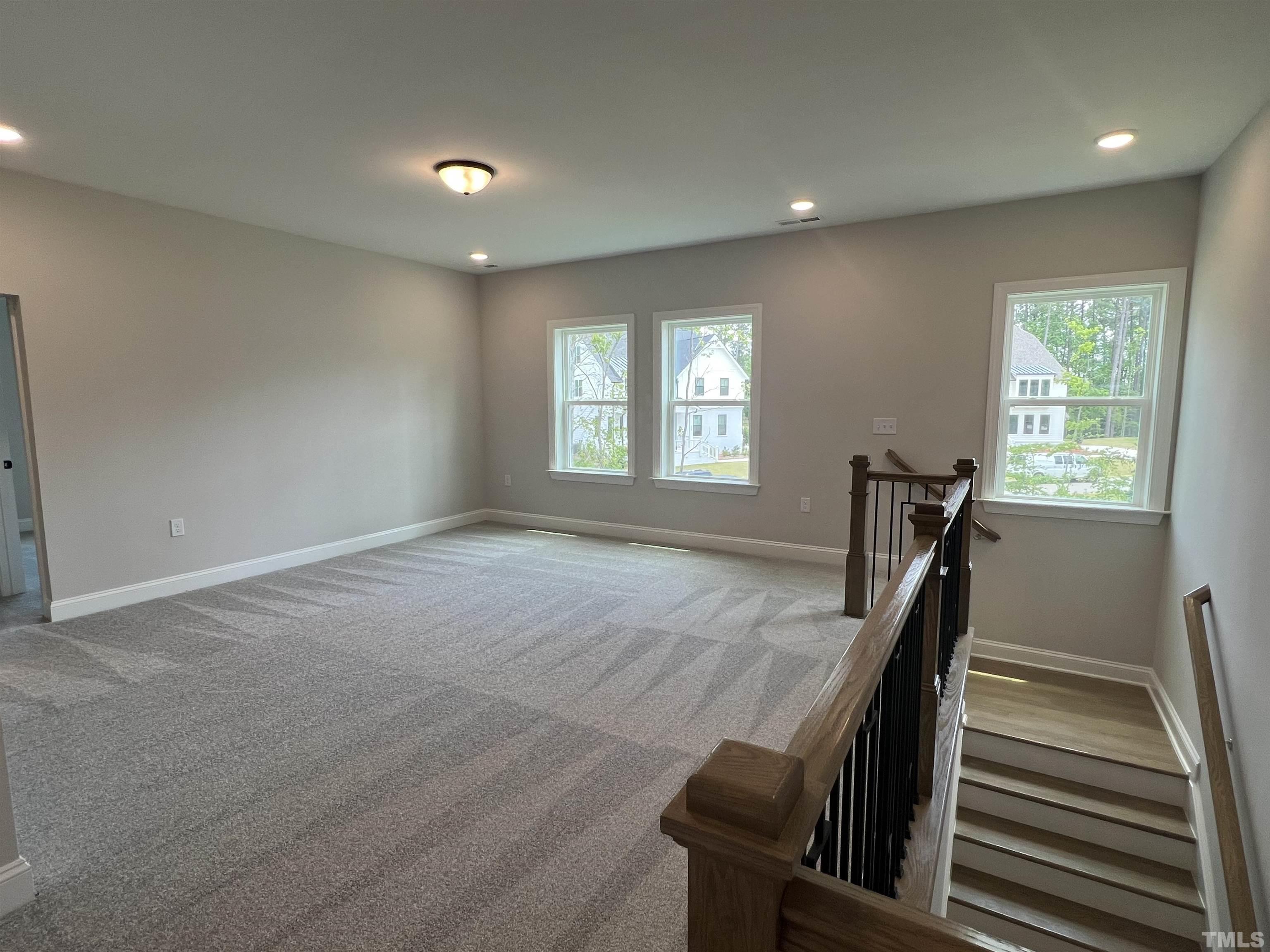 7629 Hasentree Way, Unit 519 Wake Forest, NC 27587 - Photo 37 of 76 a view of an empty room with a window