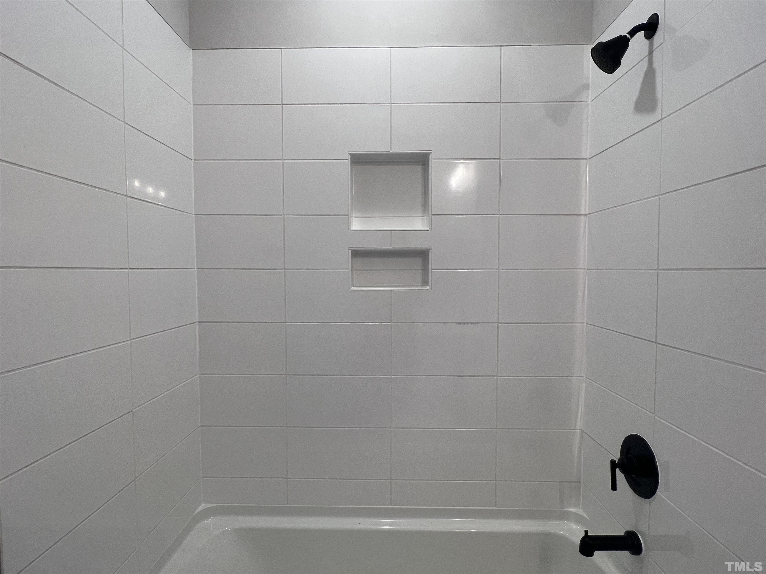 7629 Hasentree Way, Unit 519 Wake Forest, NC 27587 - Photo 40 of 76 a bathroom with a bathtub