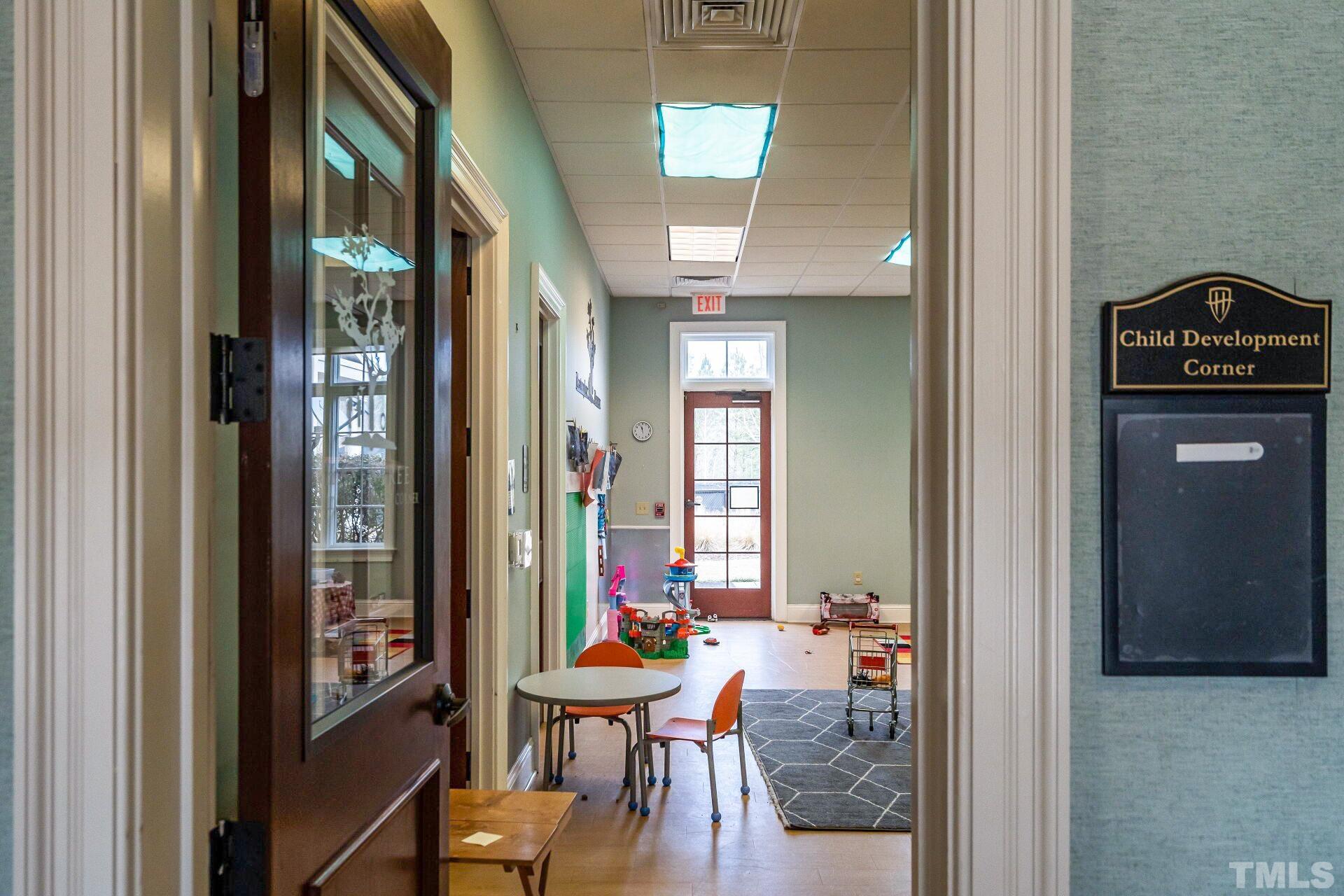 7629 Hasentree Way, Unit 519 Wake Forest, NC 27587 - Photo 73 of 76 a view of a hallway with dining area closet and wooden floor