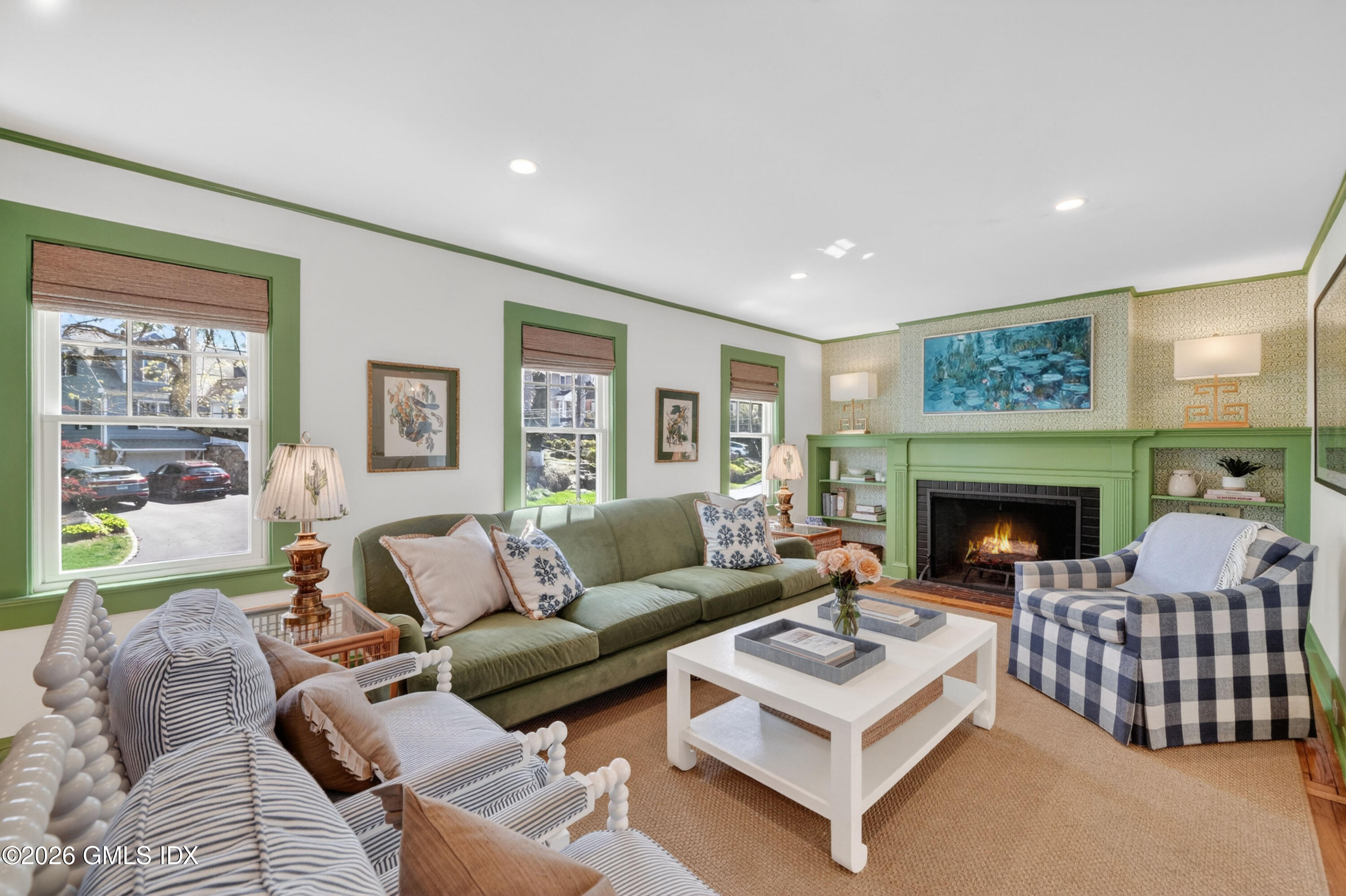 20 Ridge Road Cos Cob, CT 06807 - Photo 7 of 36 a living room with furniture and a fireplace