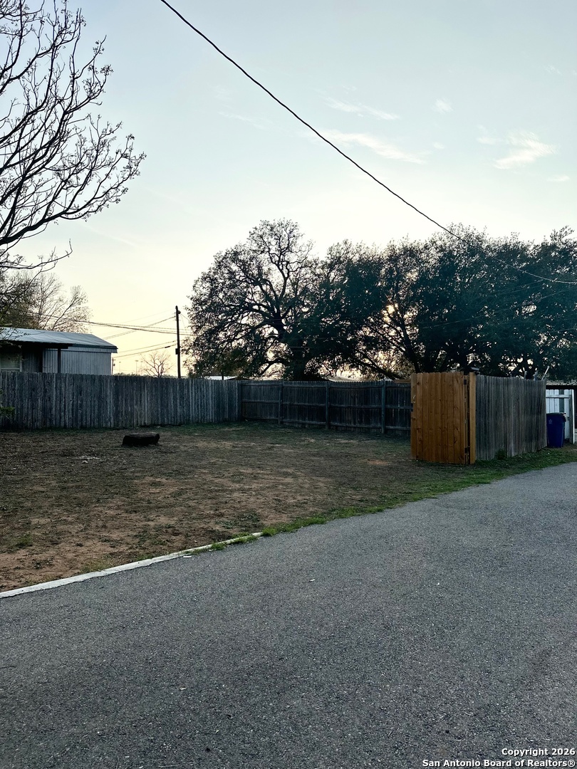 1608 The Ln Street Pleasanton, TX 78064 - Photo 2 of 10 a view of a barn
