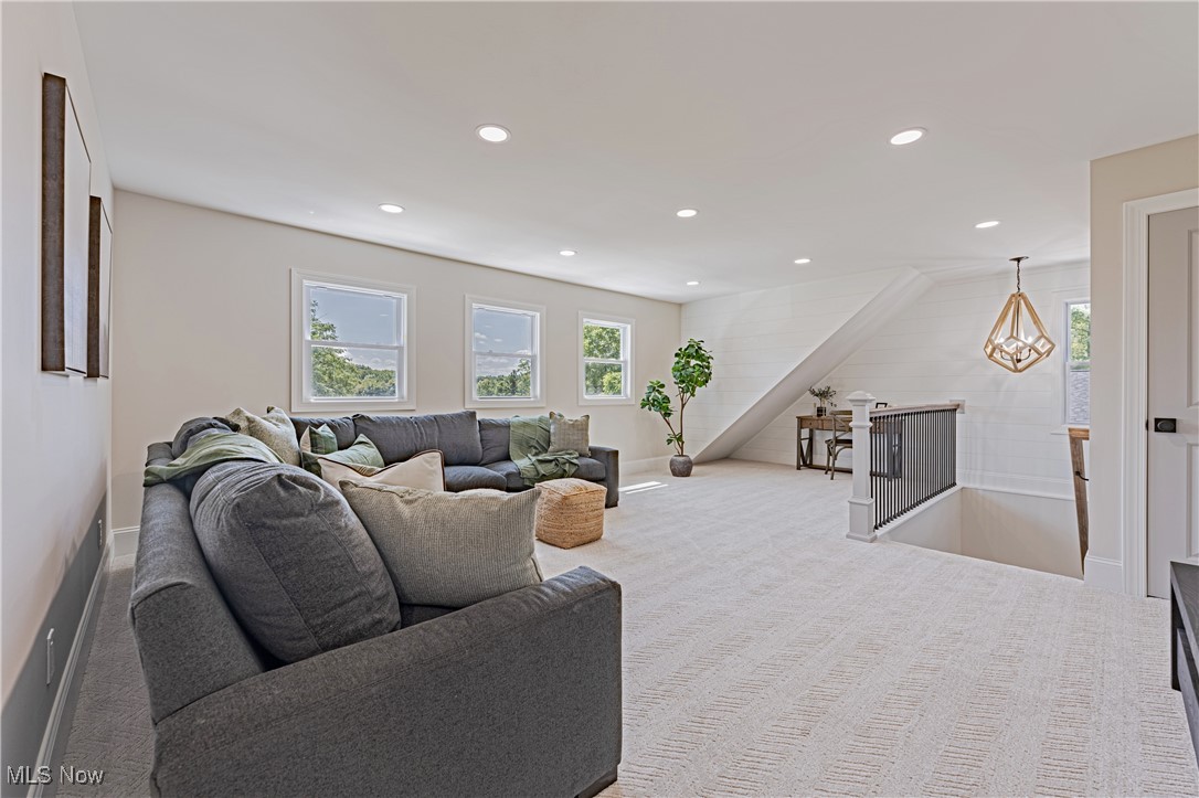 1572 Bell Road Chagrin Falls, OH 44022 - Photo 23 of 36 Living room with light colored carpet