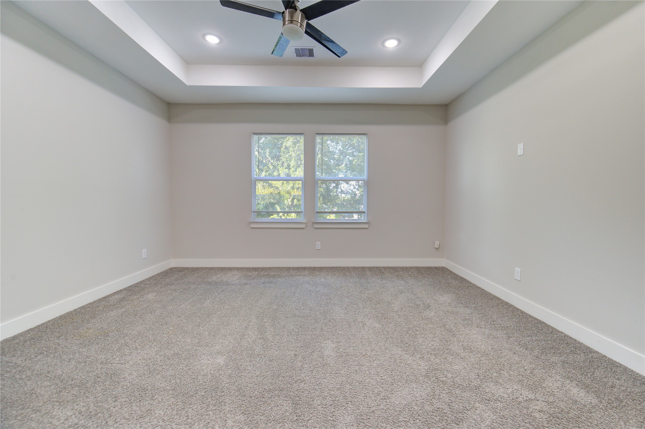 4536 Sunflower Street Houston, TX 77051 - Photo 14 of 27 an empty room with a window and a projector screen