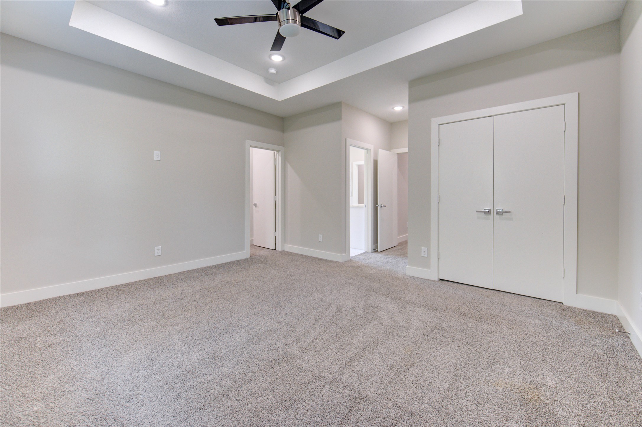 4536 Sunflower Street Houston, TX 77051 - Photo 15 of 27 an empty room with a ceiling fan and a window