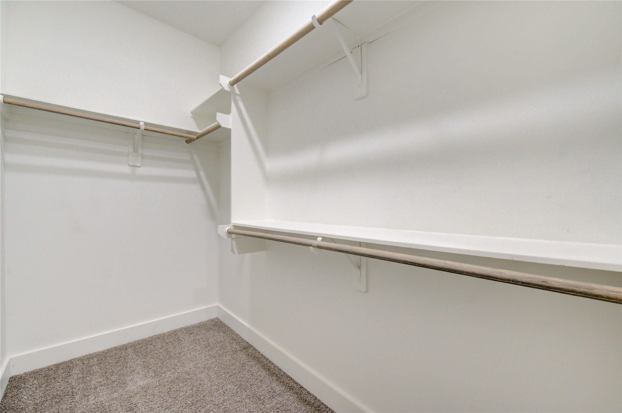 4536 Sunflower Street Houston, TX 77051 - Photo 18 of 27 a view of an empty walk in closet