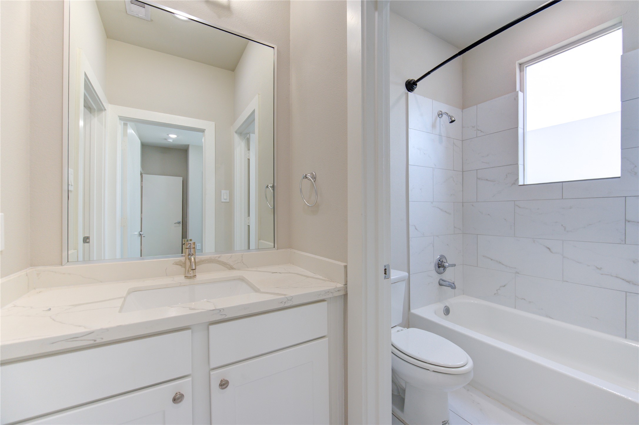 4536 Sunflower Street Houston, TX 77051 - Photo 22 of 27 a bathroom with a sink a toilet and a bathtub
