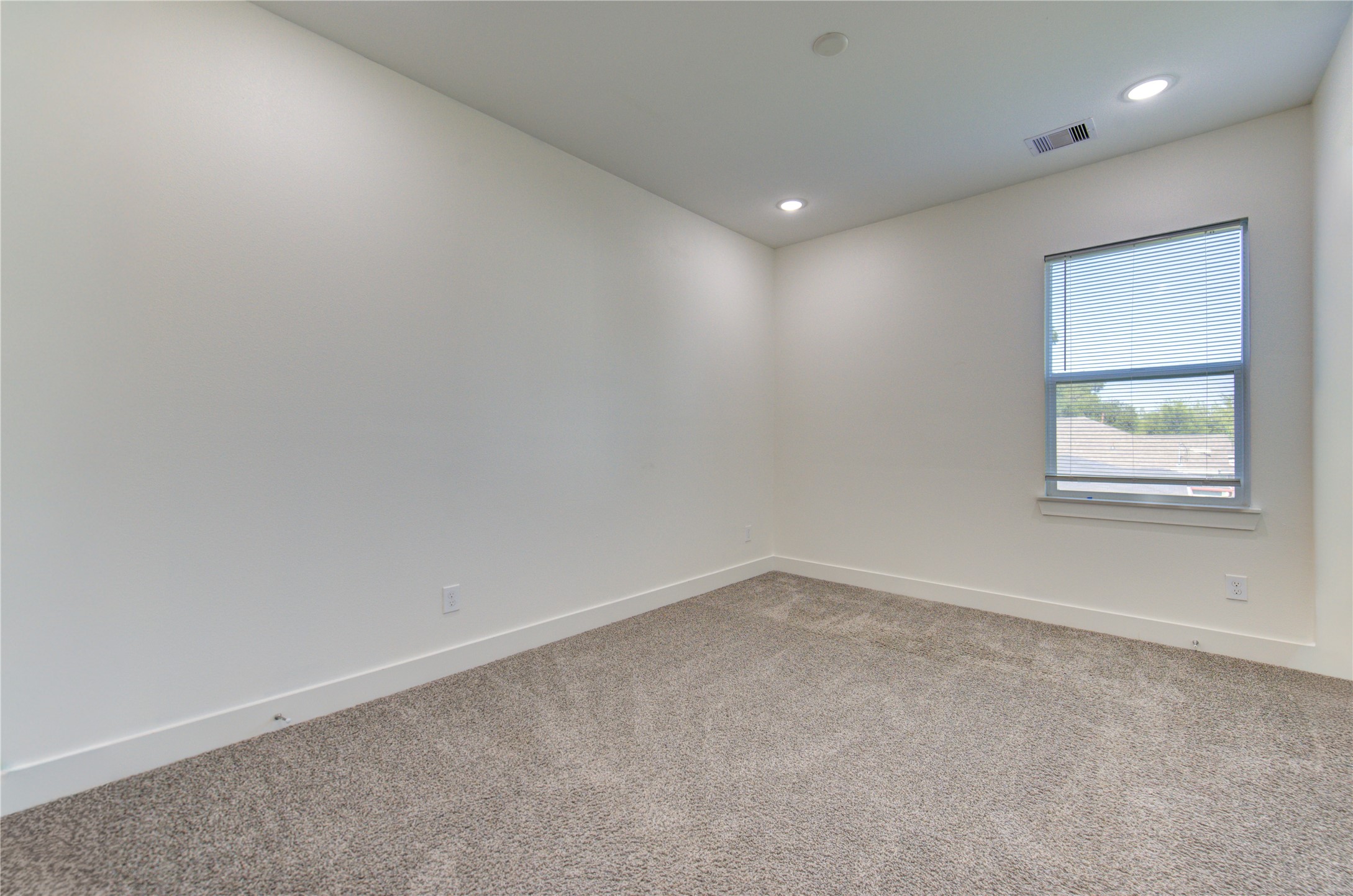4536 Sunflower Street Houston, TX 77051 - Photo 24 of 27 an empty room with windows