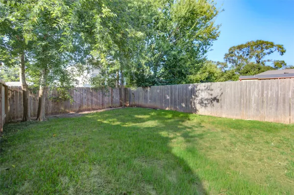 a view of a backyard with a garden