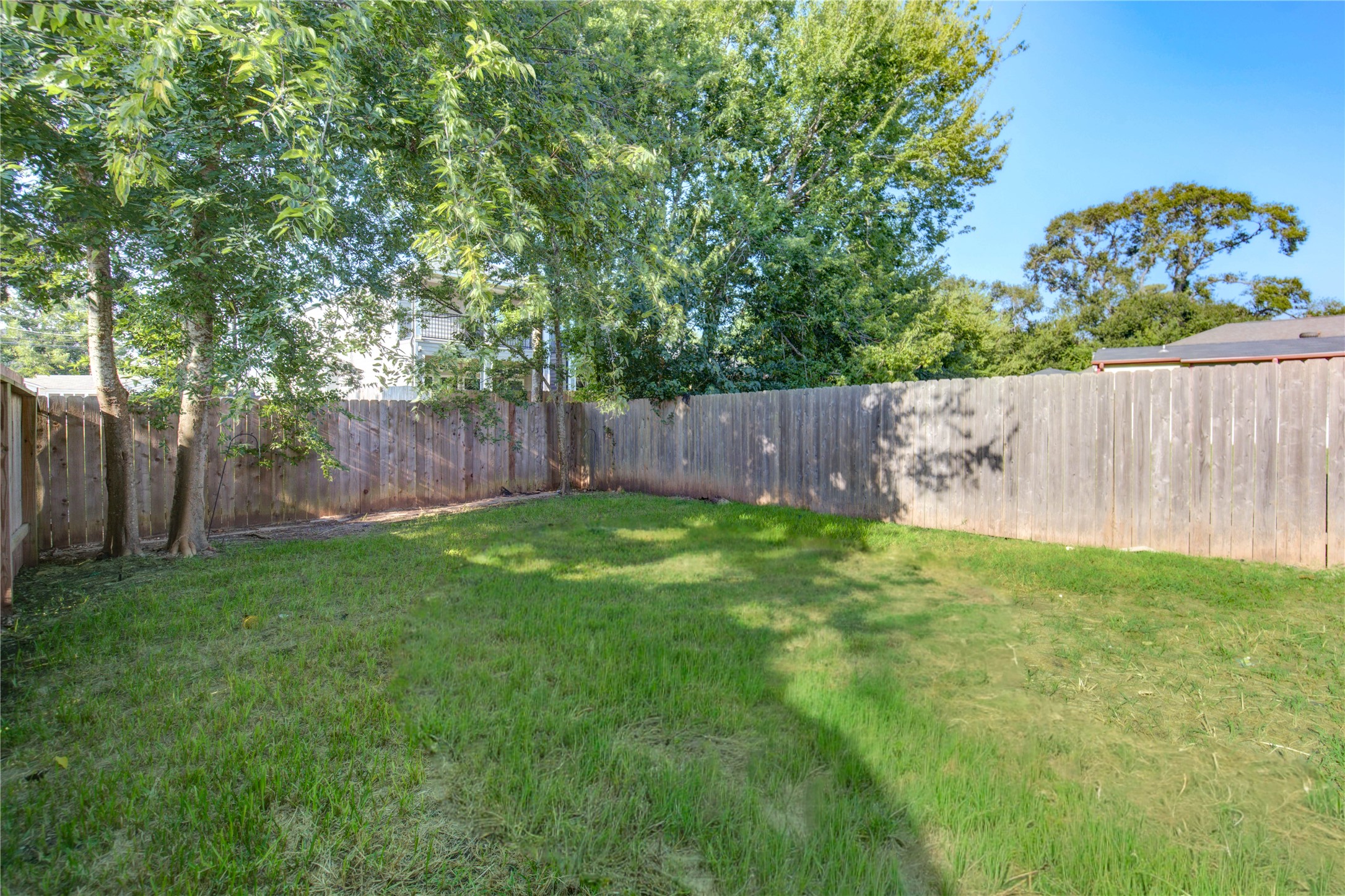 4536 Sunflower Street Houston, TX 77051 - Photo 27 of 27 a view of a backyard with a garden