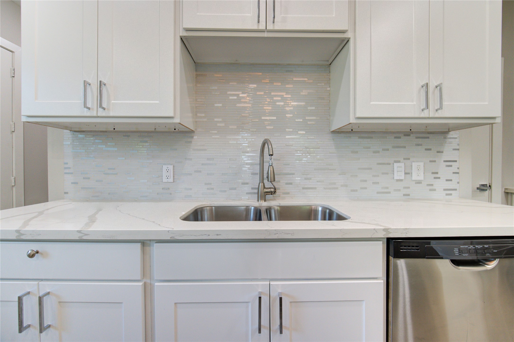 4536 Sunflower Street Houston, TX 77051 - Photo 9 of 27 a kitchen with a sink and cabinets