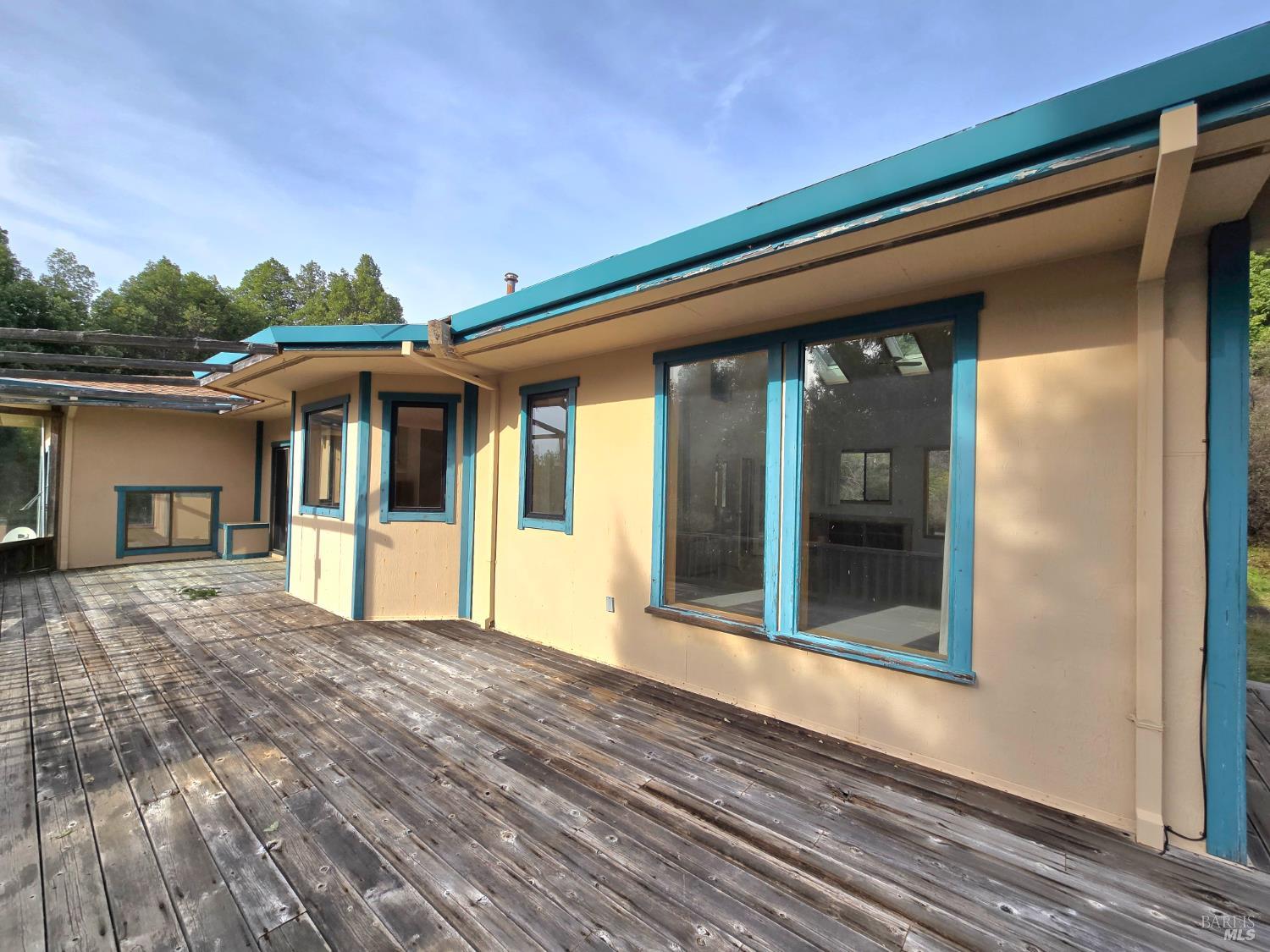 36955 Eureka Stagecoach Road Willits, CA 95490 - Photo 28 of 45 a view of house with backyard and glass door