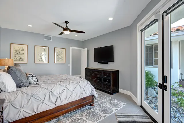 a bathroom with a sink double vanity and a mirror