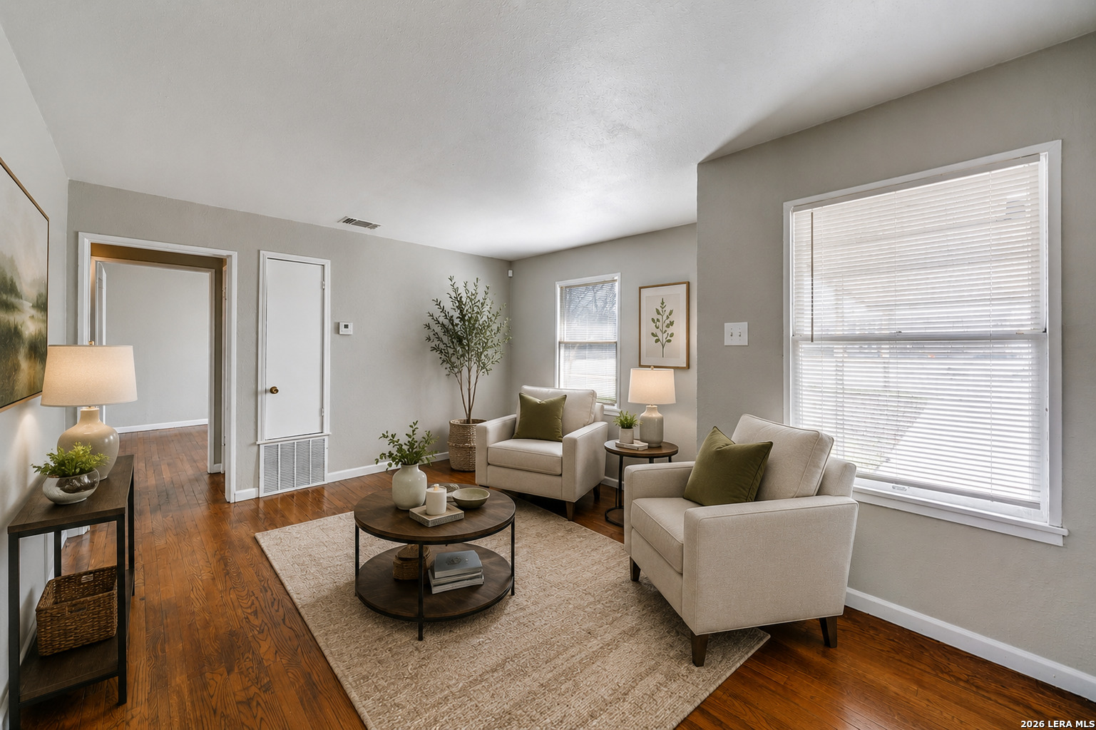 2307 Basse Road San Antonio, TX 78213 - Photo 3 of 17 a living room with furniture and a potted plant