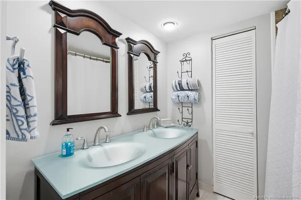 a bathroom with a shower and a toilet