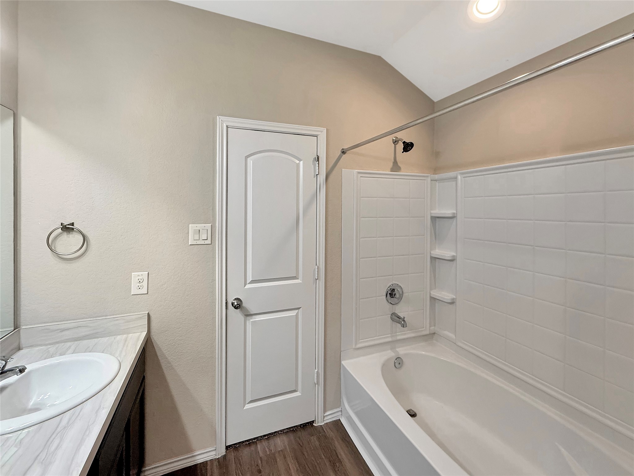 15443 Cipres Verde Street Channelview, TX 77530 - Photo 16 of 27 a bathroom with a tub a sink and a mirror