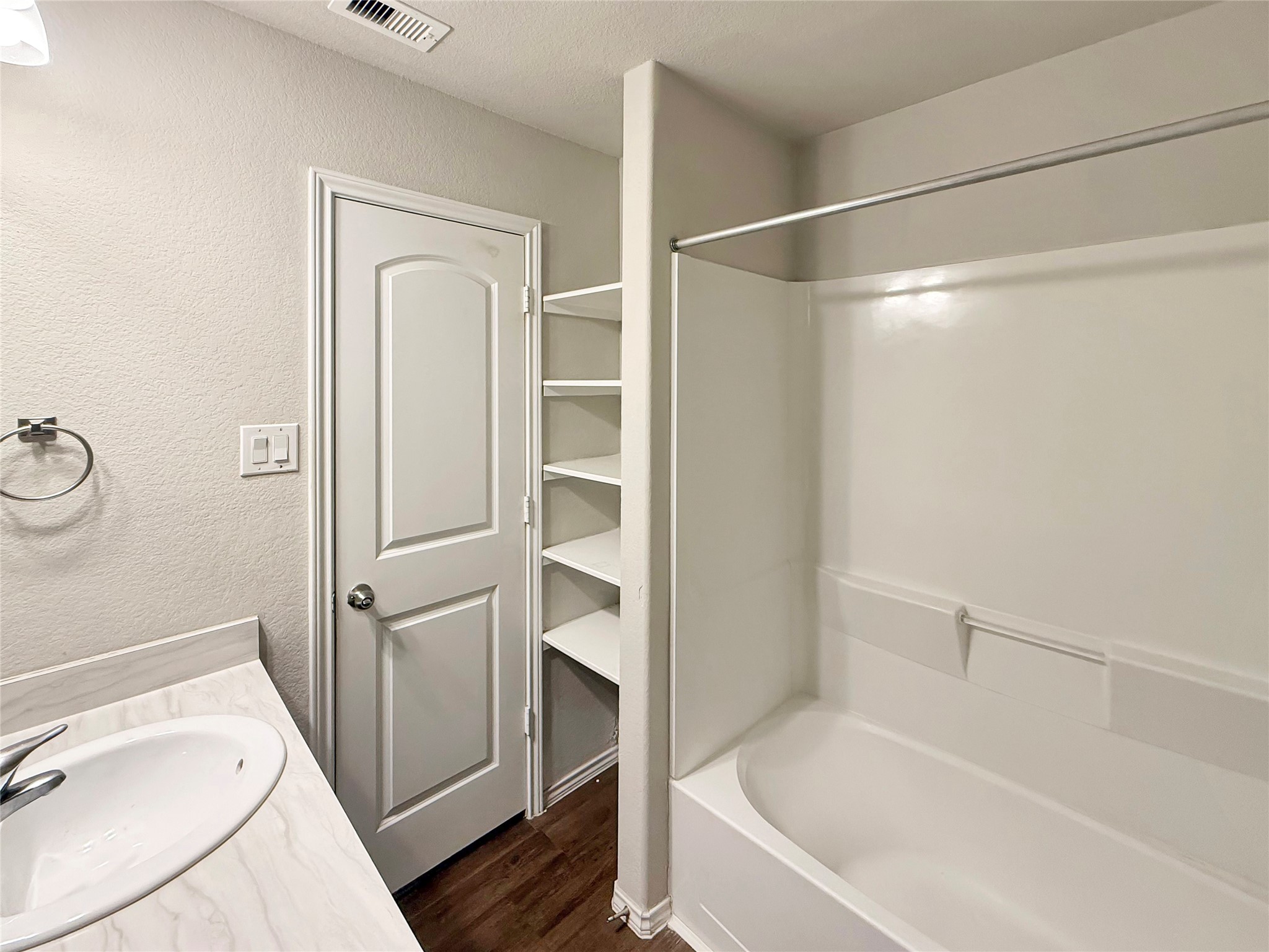15443 Cipres Verde Street Channelview, TX 77530 - Photo 24 of 27 a bathroom with a tub and shower
