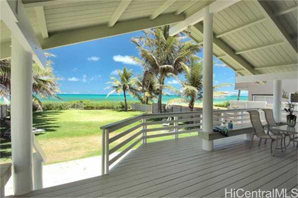 Undisclosed Address Kailua, HI 96734 - Photo 1 of 1 a view of a swimming pool with lawn chairs with wooden floor