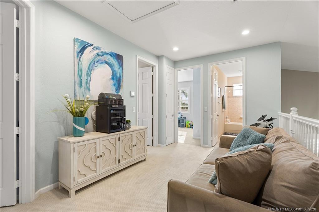 2973 Southwest Porpoise Circle Stuart, FL 34997 - Photo 19 of 47 a living room with furniture