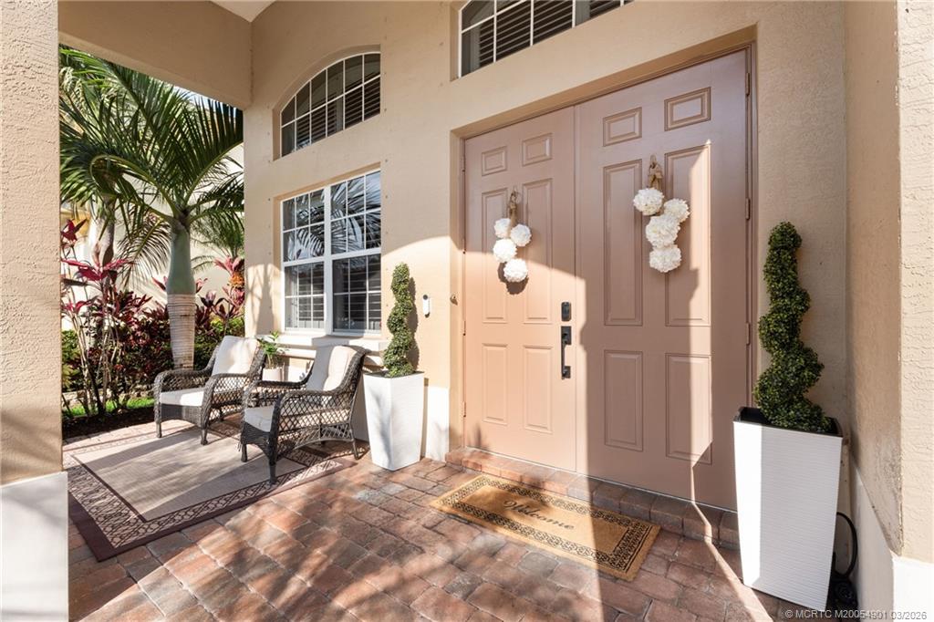 2973 Southwest Porpoise Circle Stuart, FL 34997 - Photo 47 of 47 a view of living room and porch with furniture