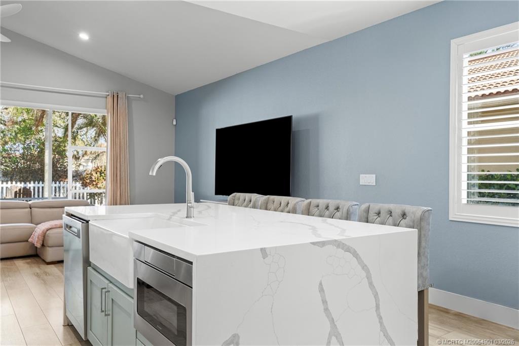 2973 Southwest Porpoise Circle Stuart, FL 34997 - Photo 8 of 47 a utility room with dryer and washer