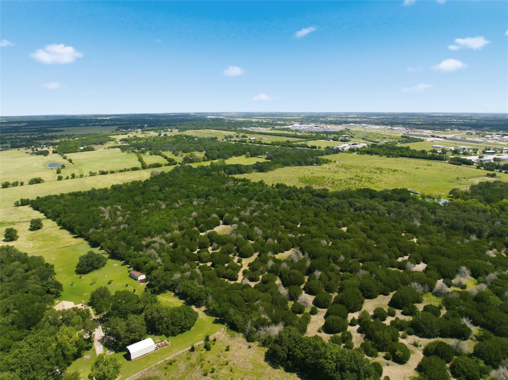 663 North Katy Road Elm Mott, TX 76640 - Photo 20 of 25 Acreage featuring mature trees and open grasslands