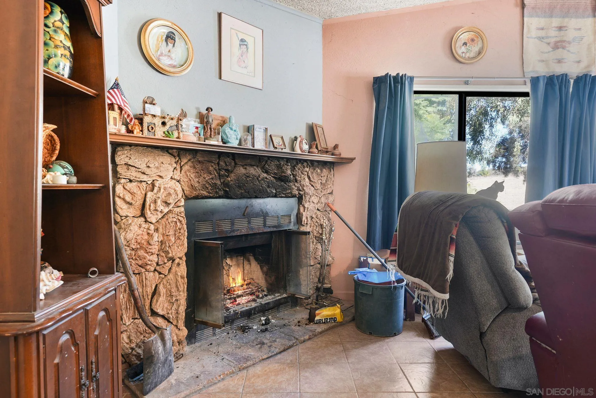 1070 Harris Ranch Road Potrero, CA 91963 - Photo 11 of 58 a living room with furniture and a fireplace