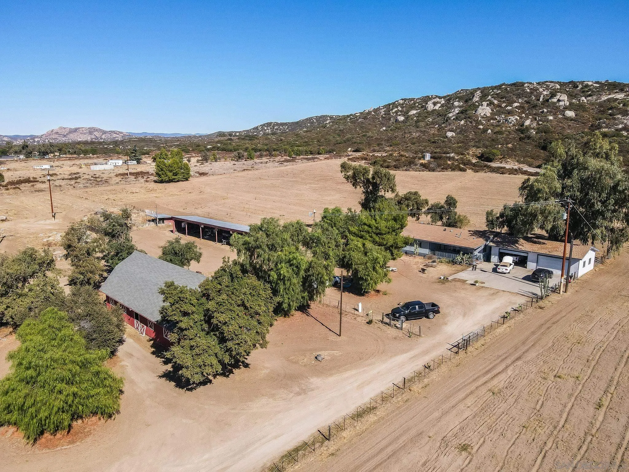 1070 Harris Ranch Road Potrero, CA 91963 - Photo 2 of 58 an aerial view of ocean with residential house and ocean view