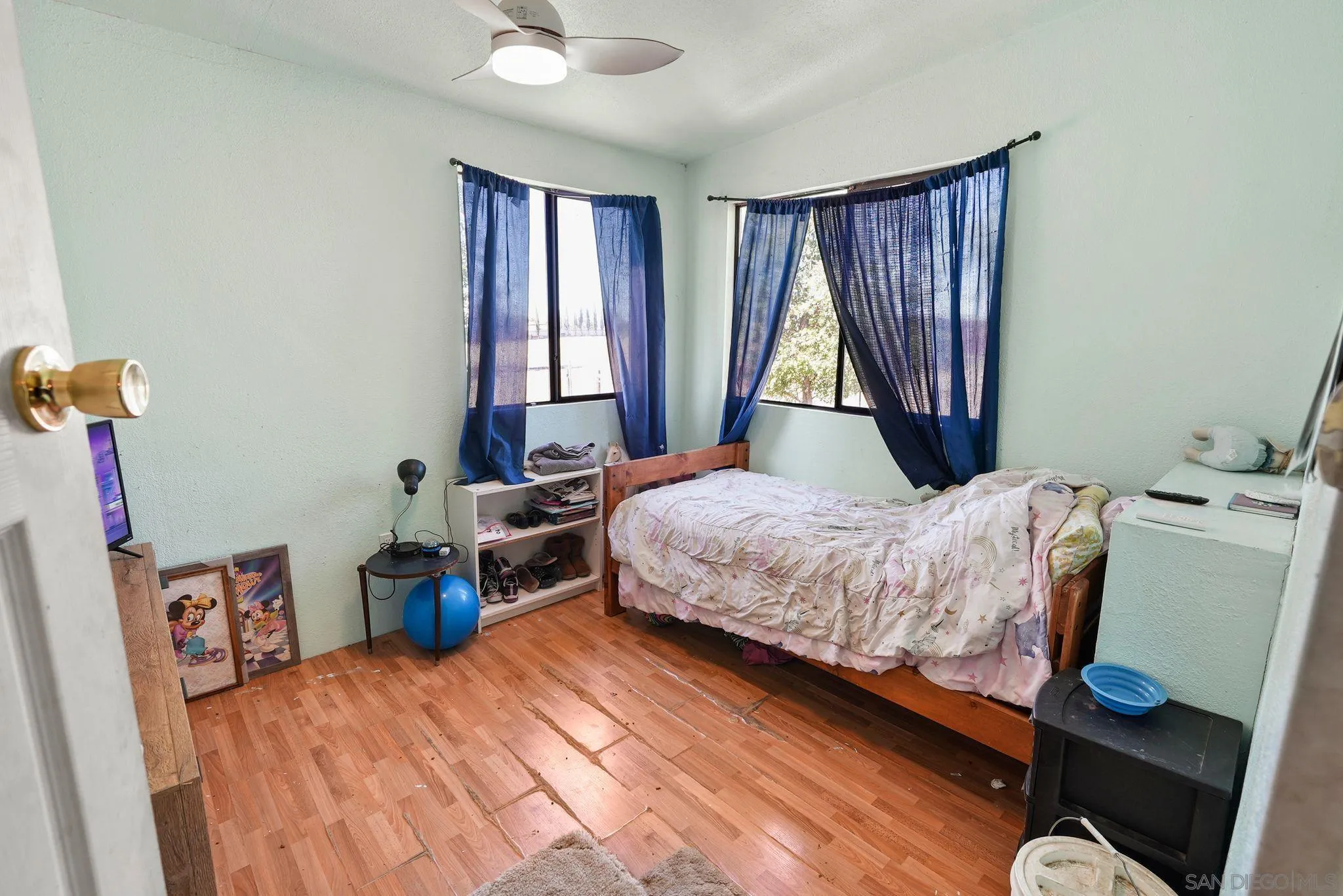 1070 Harris Ranch Road Potrero, CA 91963 - Photo 21 of 58 a bedroom with a bed and a window