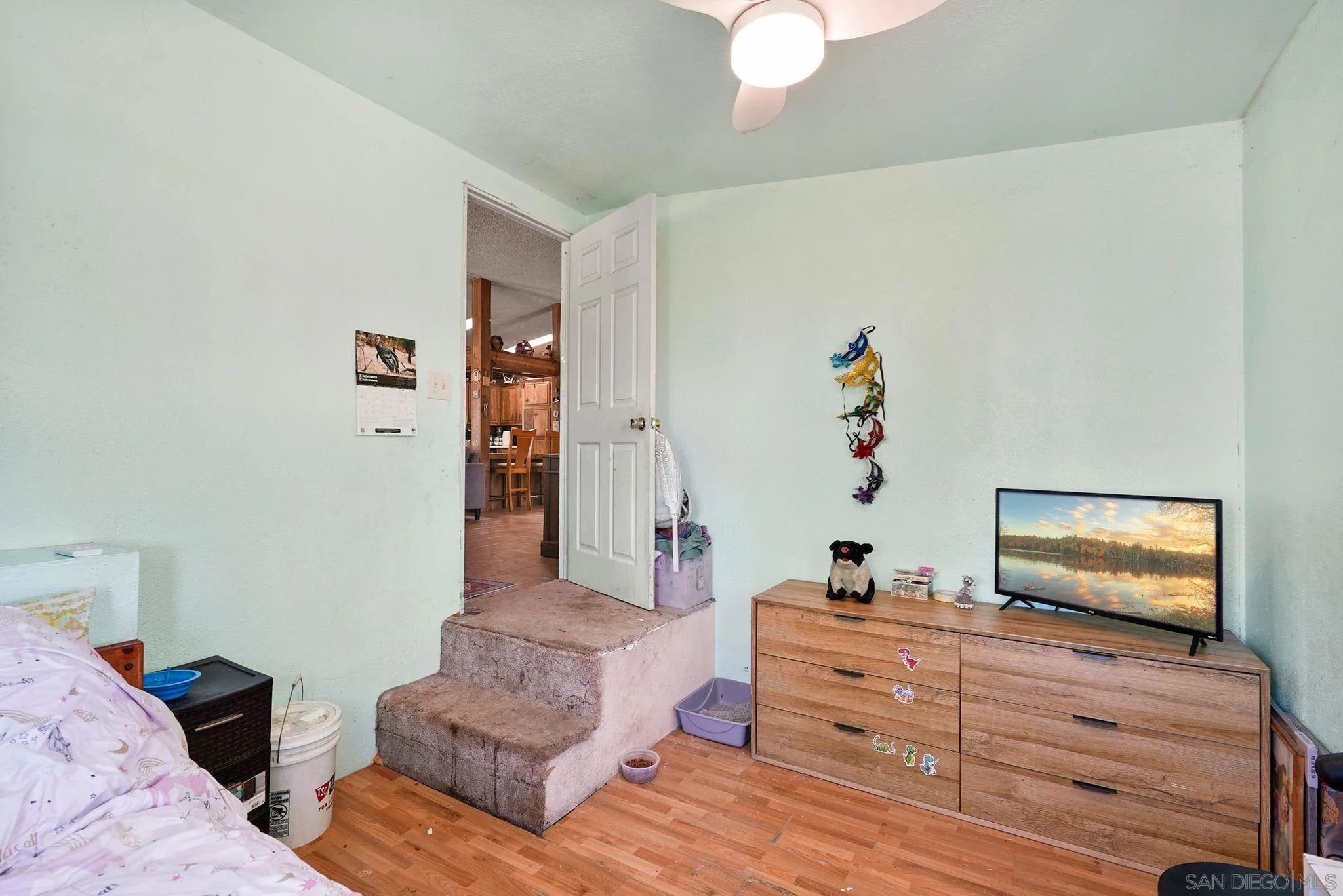 1070 Harris Ranch Road Potrero, CA 91963 - Photo 22 of 58 a bed room with two bed and a television