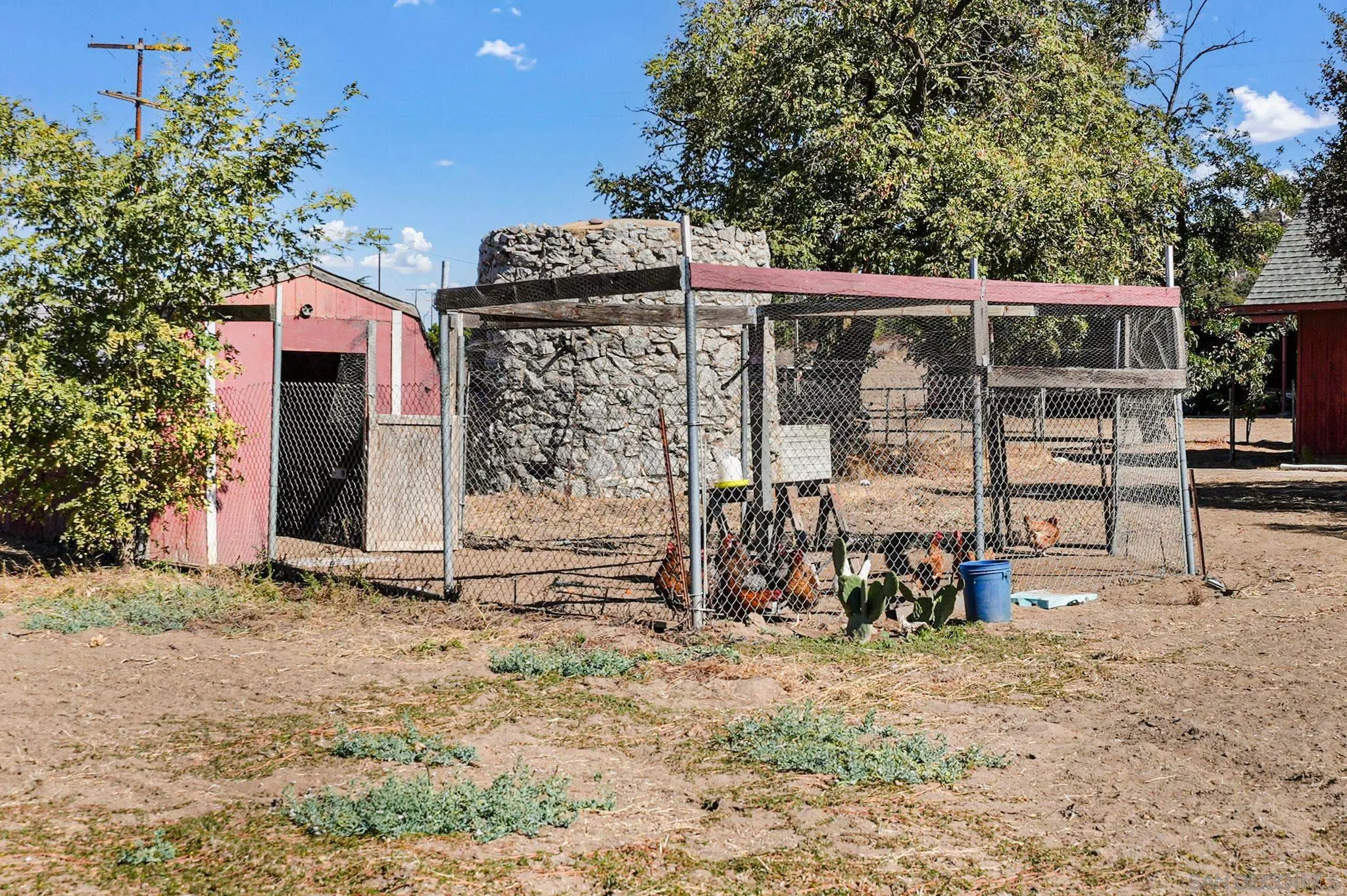 1070 Harris Ranch Road Potrero, CA 91963 - Photo 34 of 58 a view of a chairs and table in the backyard