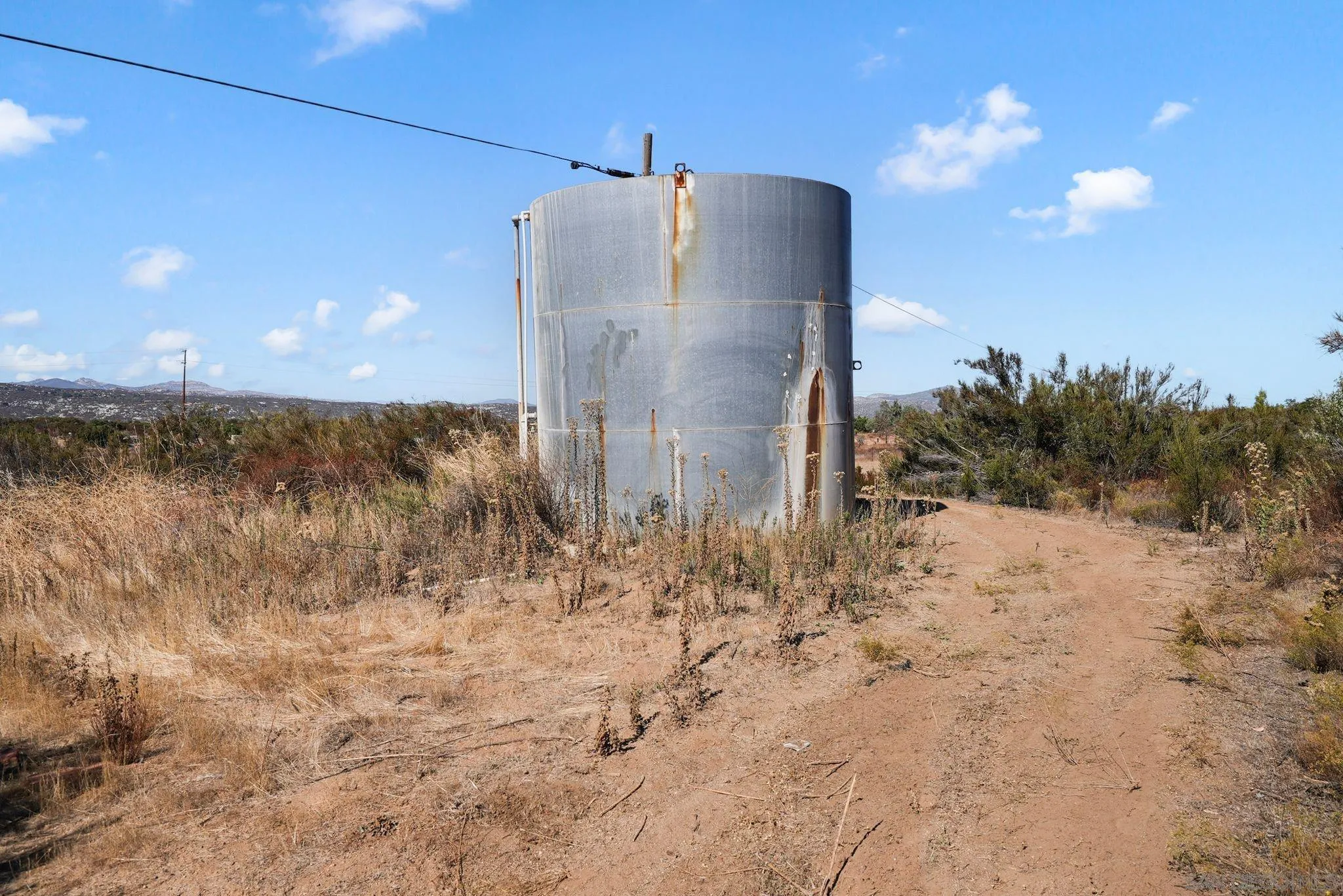1070 Harris Ranch Road Potrero, CA 91963 - Photo 37 of 58 a view of a road with a building in the background