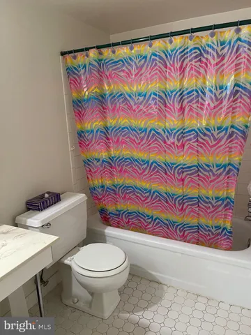 a bathroom with a vanity and a toilet